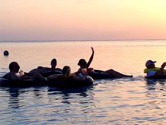 Island Tubing - Caye Caulker’s Coast - Sunset Tube Ride - Rum Punch - Anda De Wata Tours